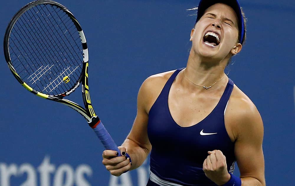 Eugenie Bouchard, of Canada, reacts after defeating Barbora Zahlavova Strycova, of the Czech Republic, during the third round of the 2014 US Open tennis tournament.