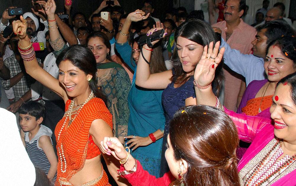 Bollywood actor Shilpa Shetty with family members participates in a procession for the immersion of an idol of the elephant-headed Hindu god Lord Ganesh after one and half day in Mumbai.