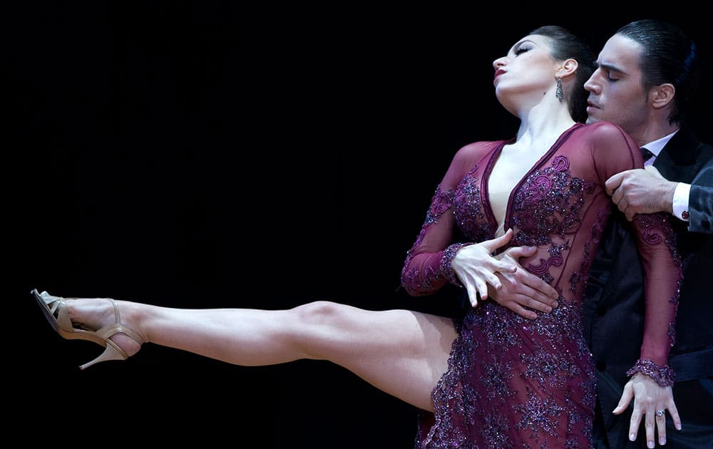 Juan Malizia Gatti and Manuela Rossi, from Argentina, compete during the 2014 Tango World Championship Stage category final, in Buenos Aires, Argentina.