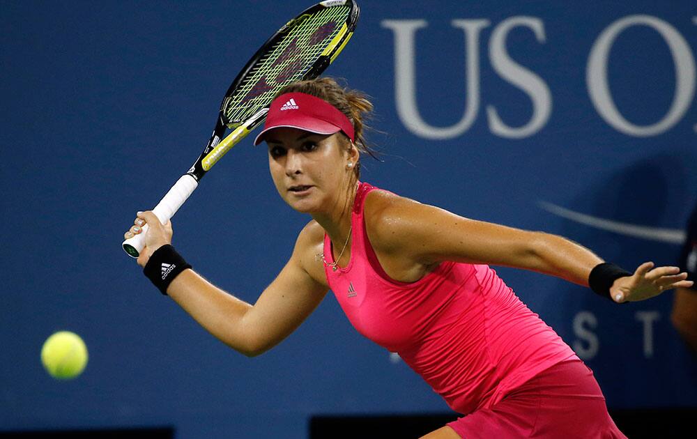 Belinda Bencic, of Switzerland, returns to Jelena Jankovic, of Serbia, during their match in the fourth round of the 2014 US Open tennis tournament.
