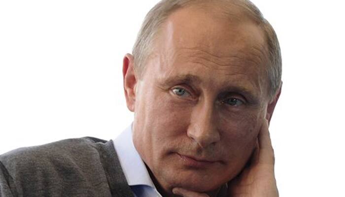 Putin urges Europeans to have `common sense` over sanctions threat 