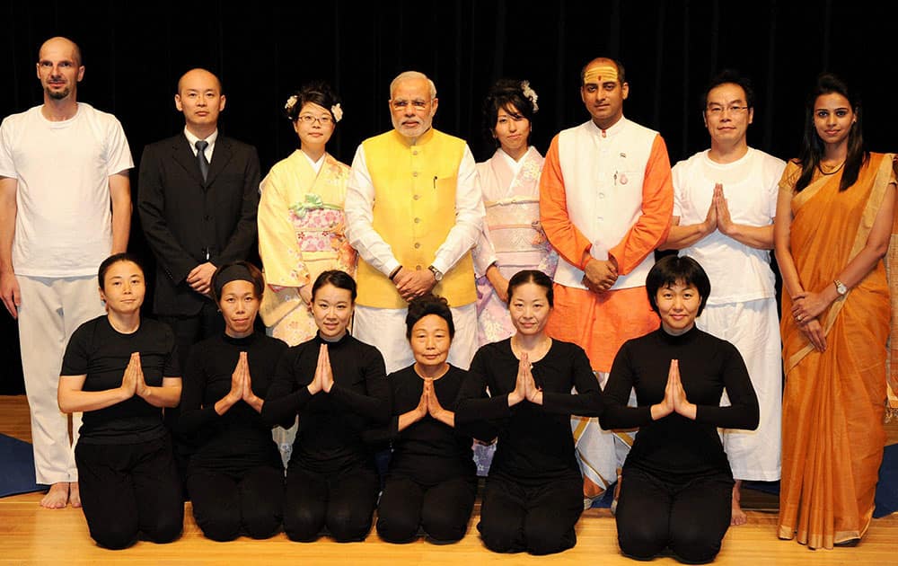 Prime Minister Narendra Modi at a photo session during inauguration of the Vivekananda Cultural Centre at the Indian embassy in Tokyo, Japan.