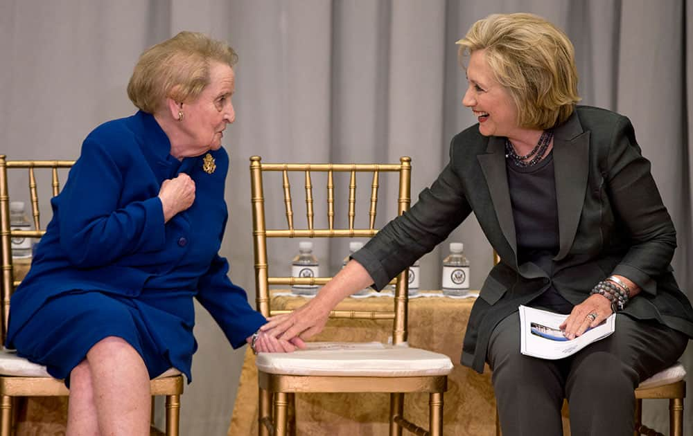 Former Secretaries of State Madeleine Albright, left, and Hillary Rodham Clinton talk during the groundbreaking ceremony for the US Diplomacy Center.