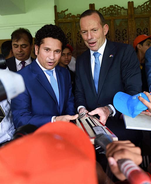 Legendary cricketer Sachin Tendulkar and Australian Prime Minister Tony Abbott during an interactive session with children at Cricket Club of India (CCI) in Mumbai.