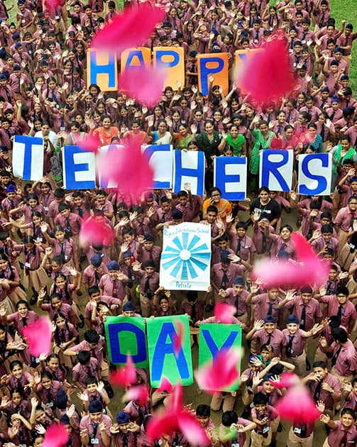 School students and teachers celebrate Teachers Day at a school in Patiala.