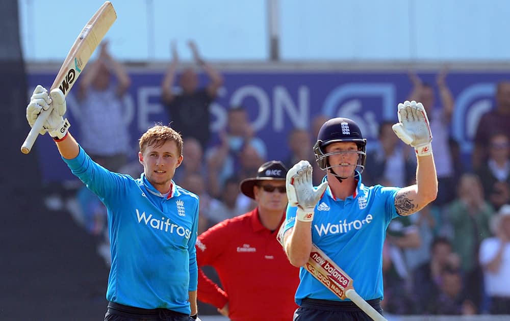 England's Joe Root celebrates after scoring a century during the fifth One Day International match between England and India at Headingley cricket ground, Leeds, England.