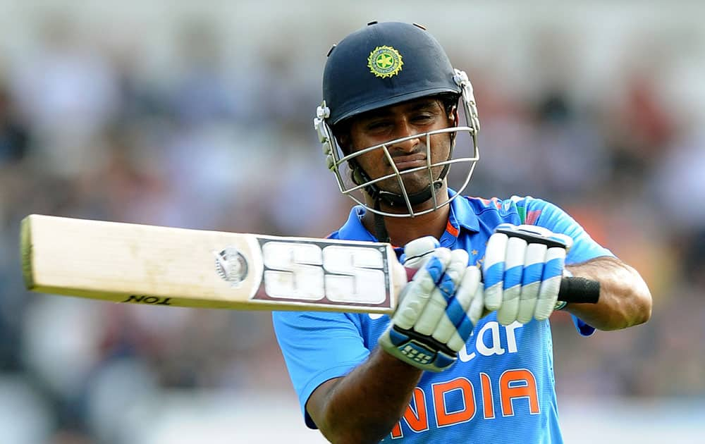 India's Ambati Rayudu reacts after being bowled by England's Ben Stokes caught Alastair Cook for 53 runs during the fifth One Day International match between England and India at Headingley cricket ground, Leeds.