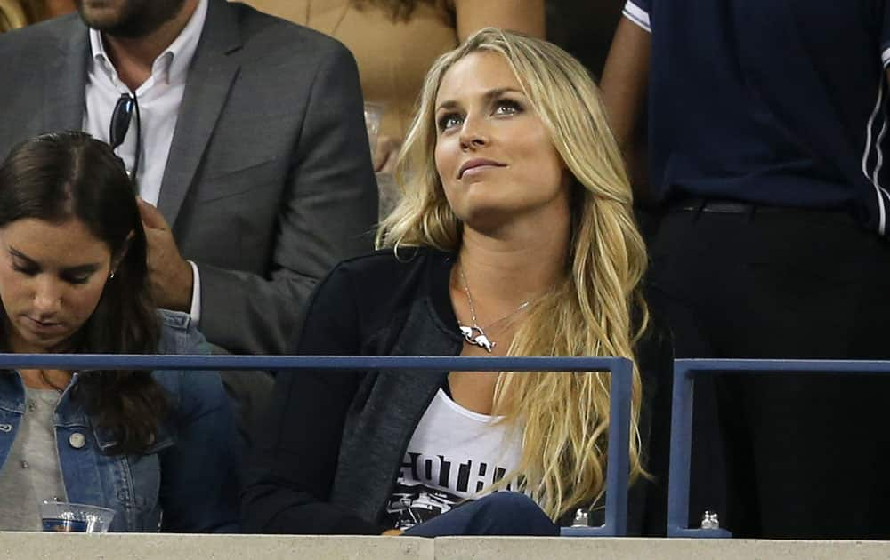 Skier Lindsey Vonn attends the quarterfinal match between Roger Federer, of Switzerland, and Gael Monfils, of France, at the US Open tennis tournament.