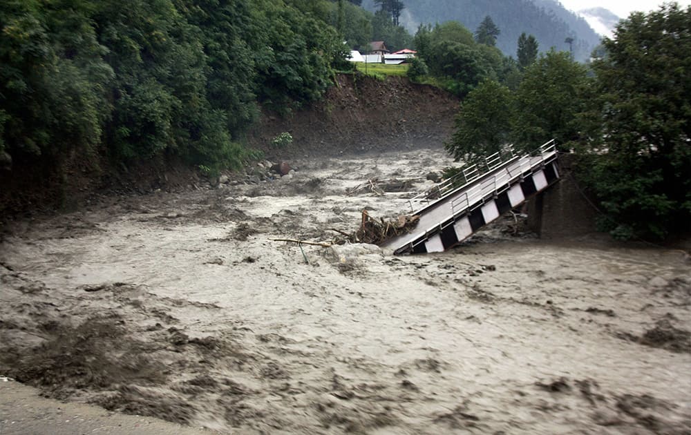 View of a bridge, which connects Uri to Baramulla, damaged due to heavy rains in Uri.