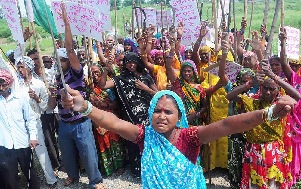 Villagers block Allahabad-Mirzapur State Highway during a protest against land Acquisition for NTPC power project at Kachari village in Allahabad.