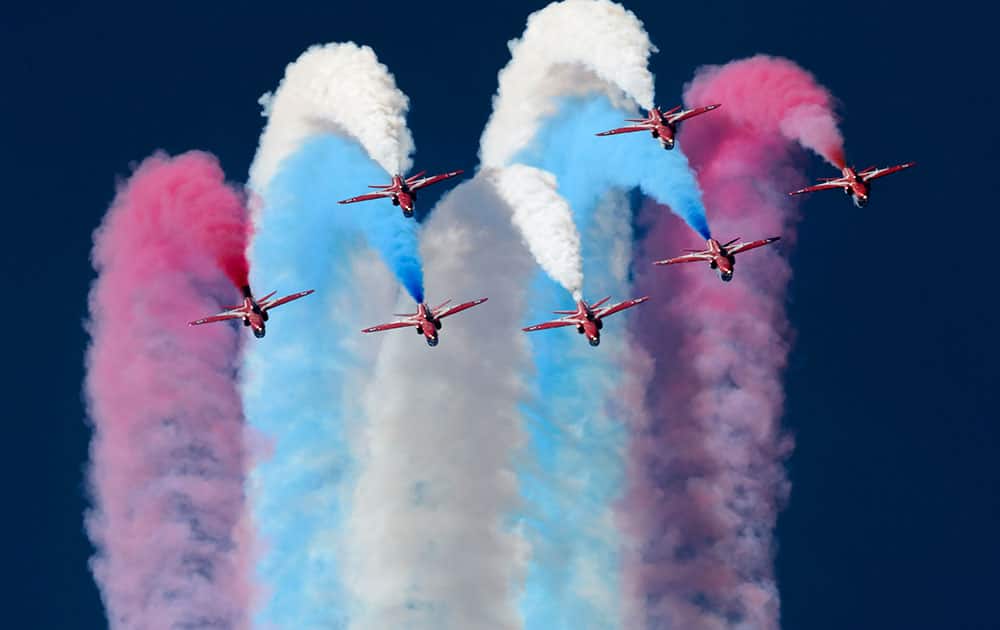 Aircrafts from the British Royal Air Force's, RAF, Red Arrows, perform at the AIR14 air show in Payerne, Switzerland.
