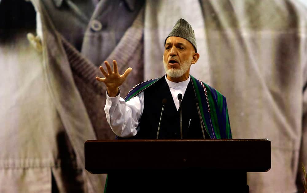 Afghan President Hamid Karzai, speaks during a ceremony honoring the late Commander Ahmad Shah Massoud, a beloved anti-Taliban fighter who was assassinated 13 years ago, in Kabul, Afghanistan.