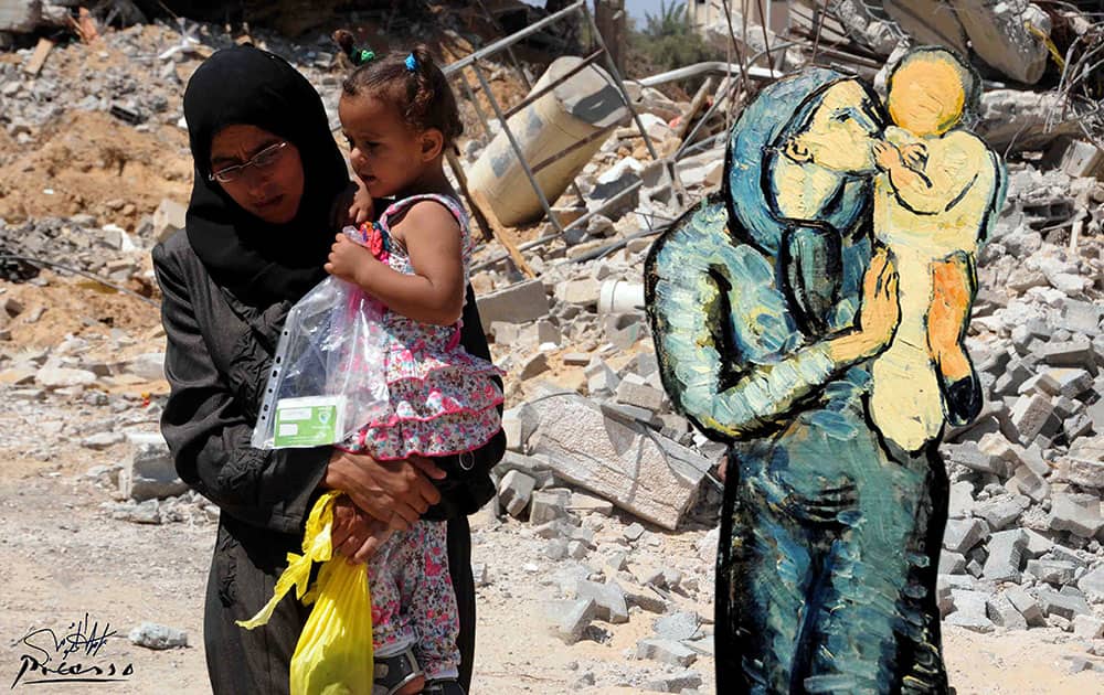 This image made available by Palestinian artist Basel al-Maqosui, shows a collaboration of a famous painting by Spanish painter, Pablo Picasso, paired with a photograph taken by al-Maqosui of a woman carrying her child as she walks past damages after an Israeli Strike hit the Gaza Strip. 