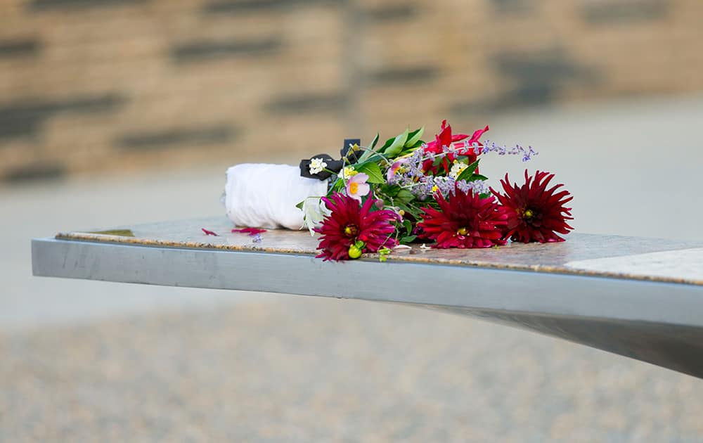 Flowers sit on one of the benches of the Pentagon Memorial at the at the Pentagon.