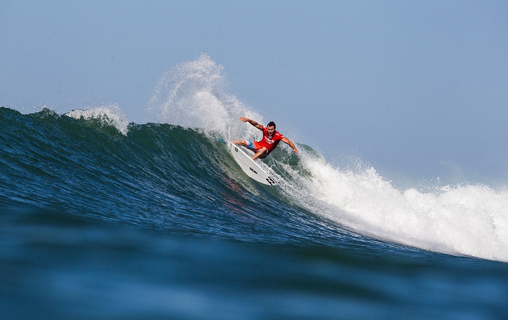 In a photo provided by the Association of Surfing Professionals, Joel Parkinson of Australia wins his Round 1 bout at the Hurley Pro Trestles over Brazil's Raoni Monteiro and Australia's Kai Otton.