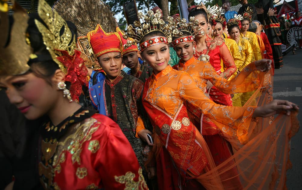 Student performers join an urban fashion show during a cultural parade in Medan, North Sumatra, Indonesia.