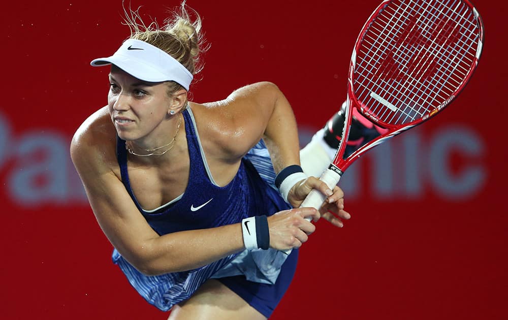 Sabine Lisicki of Germany serves during the quarter-finals match against Zheng Saisai of China at the Hong Kong Tennis Open.