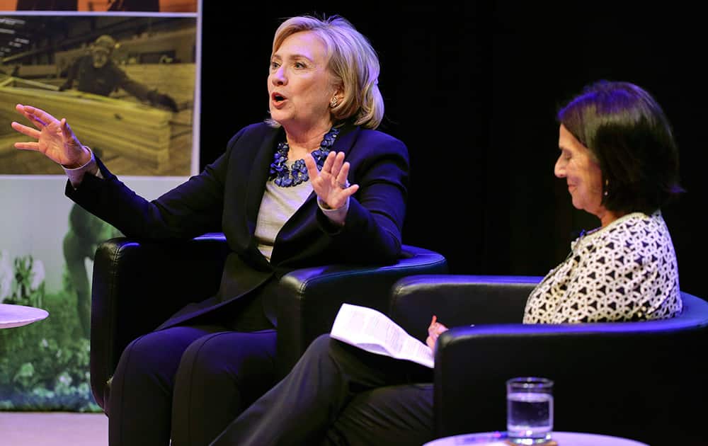 Former Secretary of State Hillary Rodham Clinton, left, answers questions from Lissa Muscatine, proprietor of the Politics and Prose bookstore during a discussion on the empowerment of women and girls at the Ford Foundation.