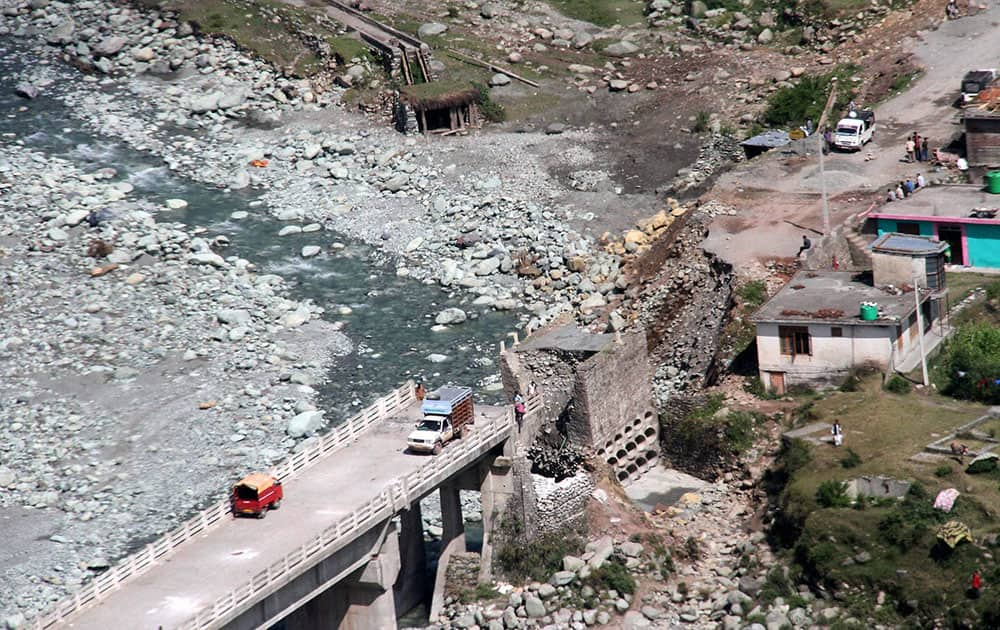 An aerial view of a bridge collapsed due to flash-floods in Kotranka tehsil of Rajouri district of Jammu and Kashmir.