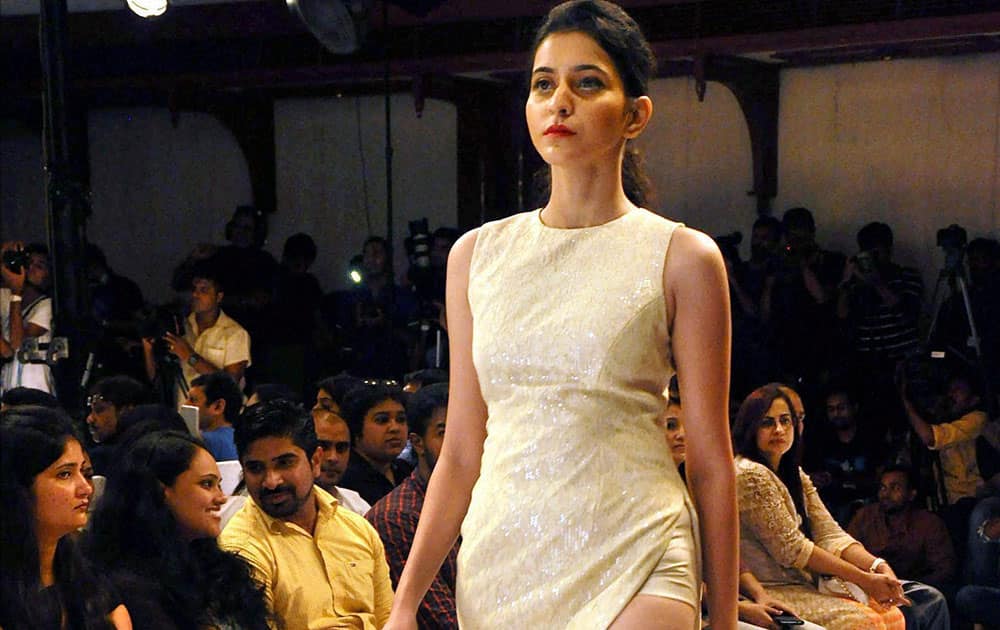 A model walks the ramp at the Kochi International Fashion week.