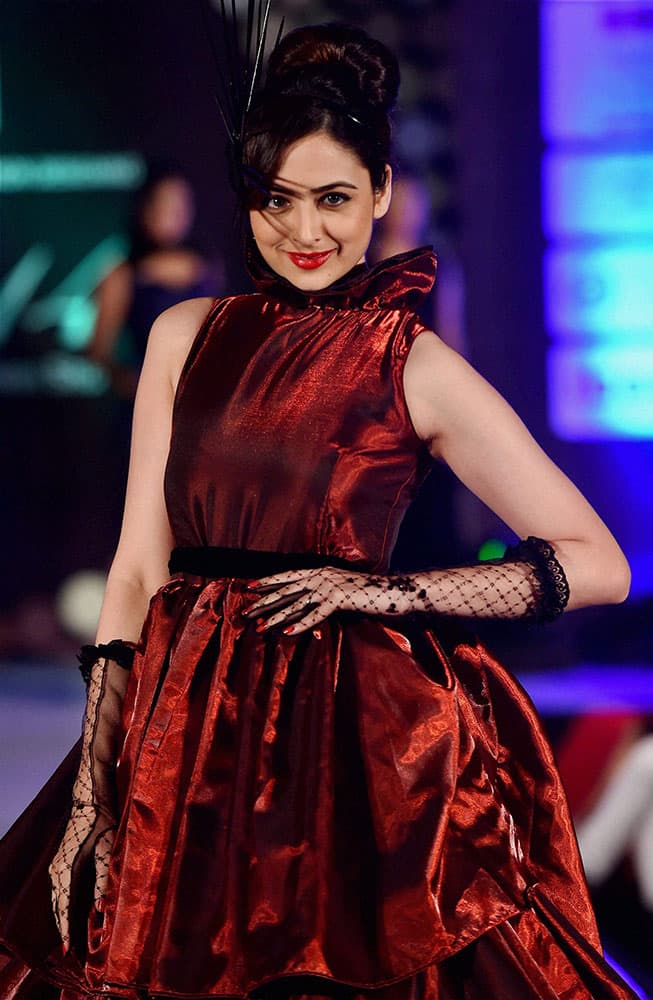 Femina Miss India 2014 Zoya Afroz walks the ramp at a fashion event in Chennai.