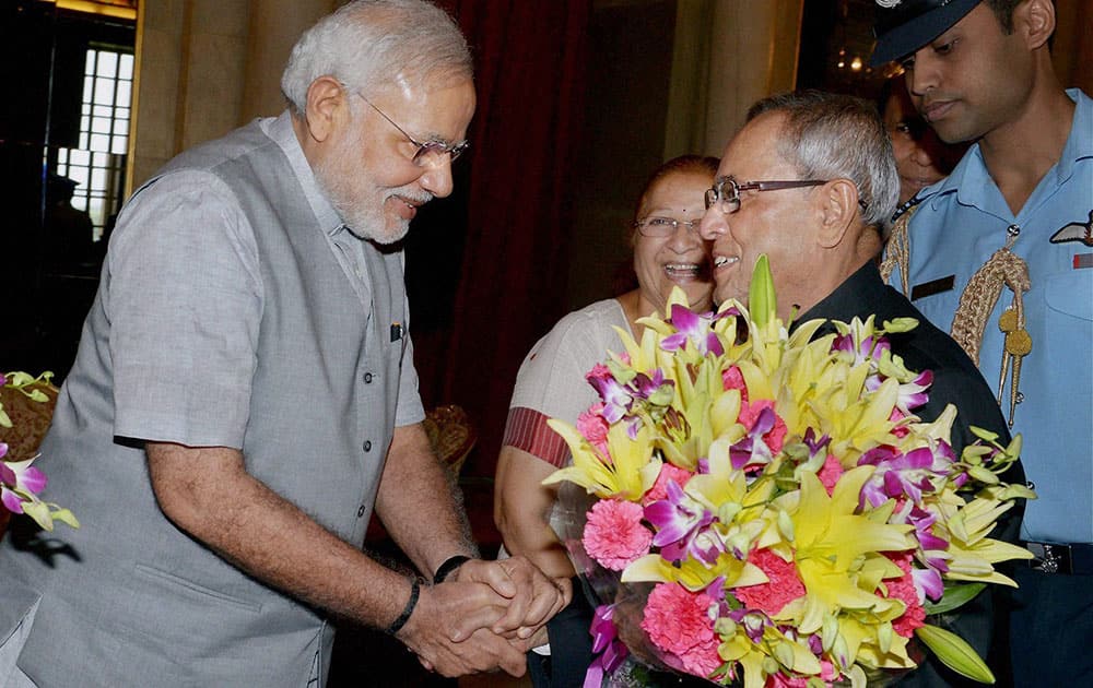 President Pranab Mukherjee is greeted by Prime Minister Narendra Modi on the occasion of his ceremonial departure for the State Visit to Vietnam at Rashtrapati Bhavan in New Delhi.