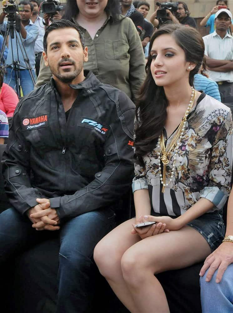 Bollywood Star John Abraham and Miss India 2014 Koyal Rana during the Flag off ceremony of ‘Mission 10000KM’ at National Stadium in New delhi.