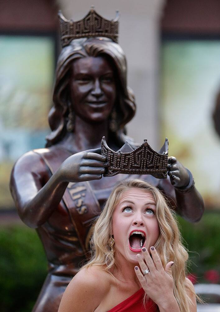 Amanda Garvin, 31, of Morgantown, W.V., poses for a photograph before the start of the Miss America 2015 pageant, Sunday, Sept. 14, 2014, in Atlantic City, N.J.