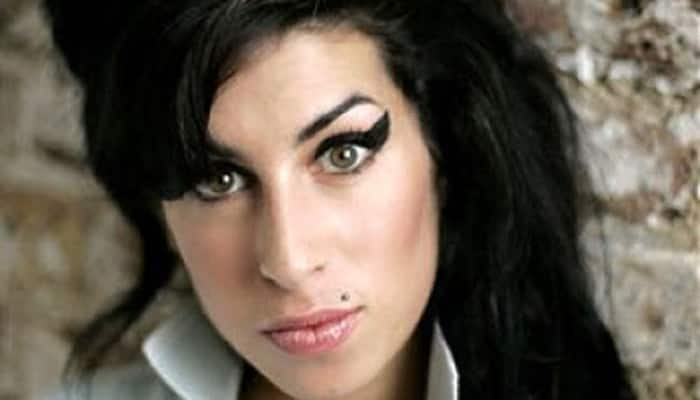 Tribute statue of Amy Winehouse unveiled in north London