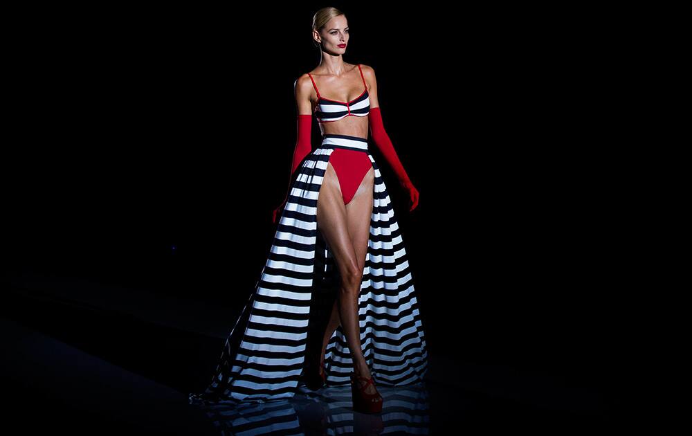 A model displays a Autumn/Winter design by Andres Sarda during the young designers show at Madrid's Fashion Week in Madrid, Spain.