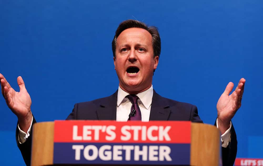 Britain's Prime Minister David Cameron gestures, as he makes a speech in Aberdeen, Scotland.