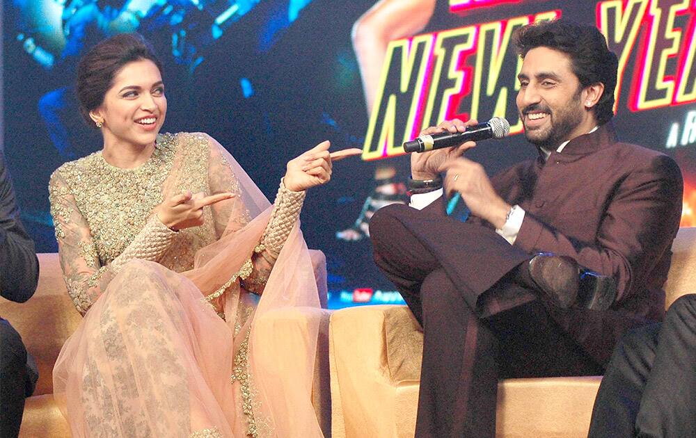 Bollywood actors Deepika Padukone and Abhishek Bachchan during the music launch of their upcoming film 'Happy New Year' in Mumbai.