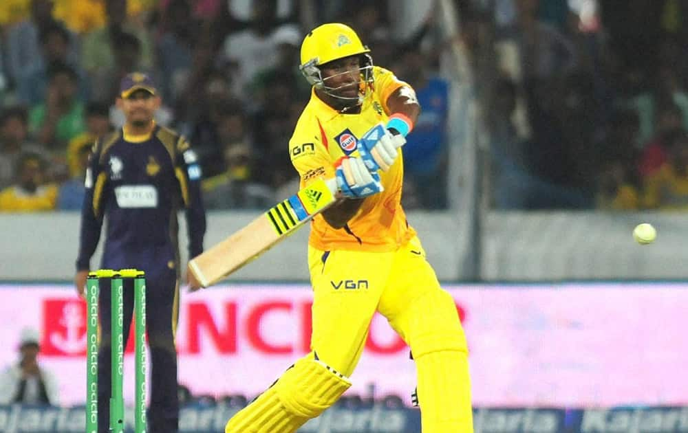 Chennai Super Kings Dwayne Bravo plays a shot against Kolkata Knight Riders during the Champions League T20 match in Hyderabad.