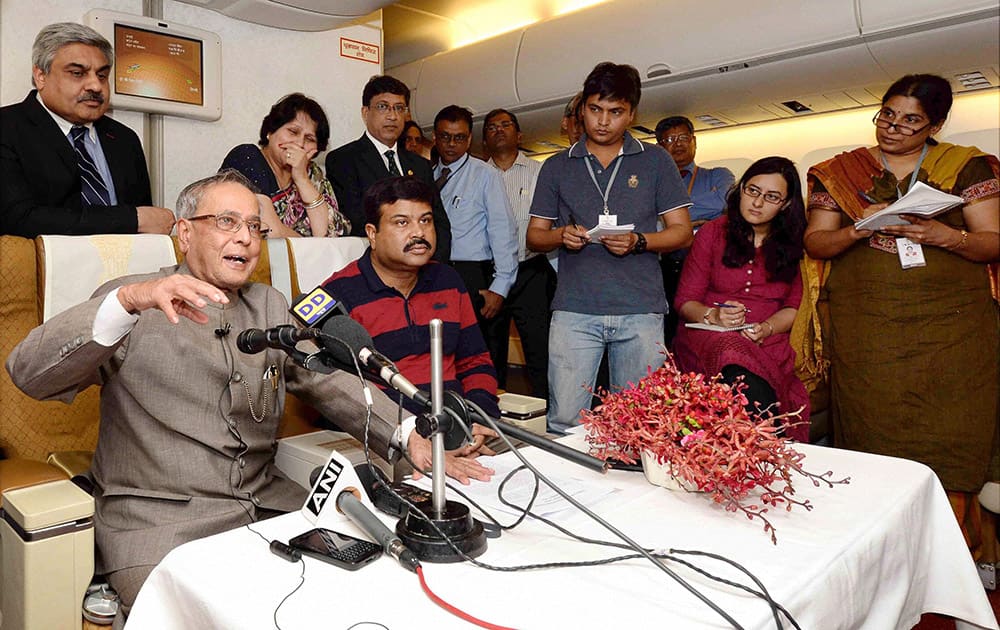 President Pranab Mukherjee interacts with his media delegation on his way back to India from Ho Chi Minh City, Vietnam.