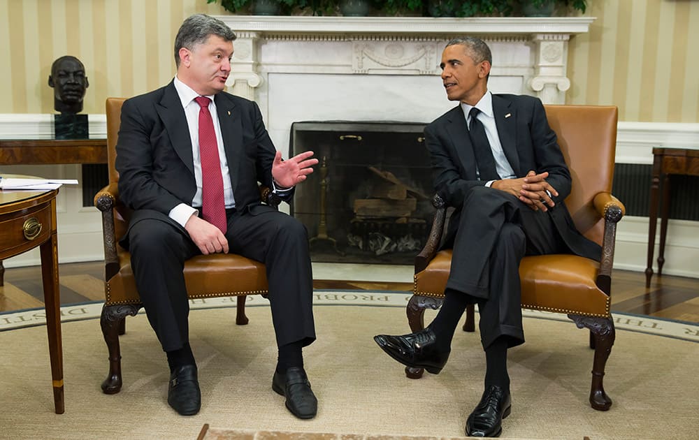 President Barack Obama, right, meets with Ukrainian President Petro Poroshenko in the Oval Office of the White House.
