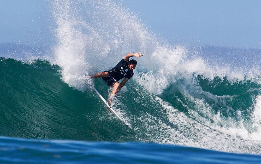 This image provided by the Association of Surfing Professionals, Jordy Smith of Durban, South Africa wins the Hurley Pro Trestles, defeating John John Florence in the final, in San Clemente, Calif.