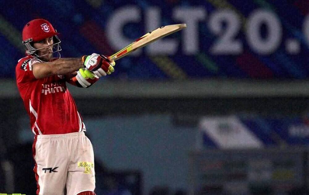 Kings XI Punjabs batsman Glenn Maxwell plays a shot against Hobart Hurricane during their Champions League Twenty20 match at Mohali.