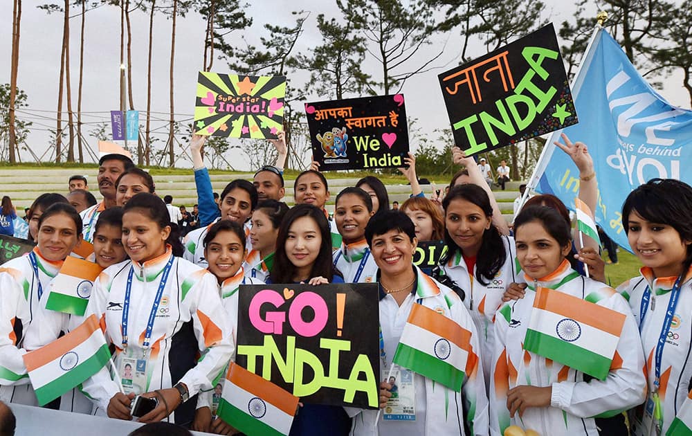 Indian athletes during the flag hoisting ceremony of 17th Asian Games in Incheon, South Korea.