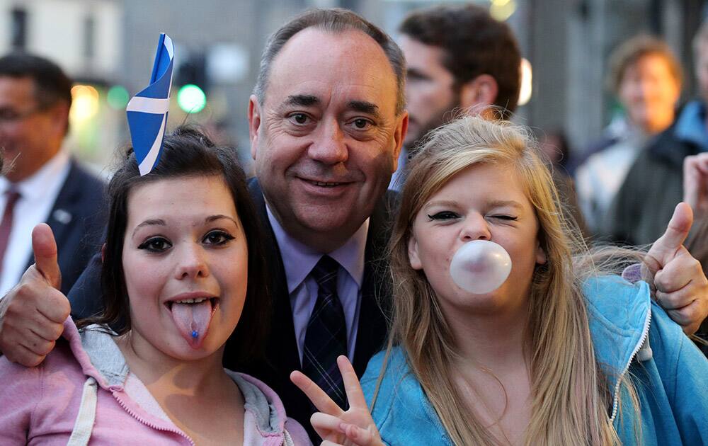 Scotland's First Minister, Alex Salmond, meets members of the public on a walkabout in Inverurie, Scotland.