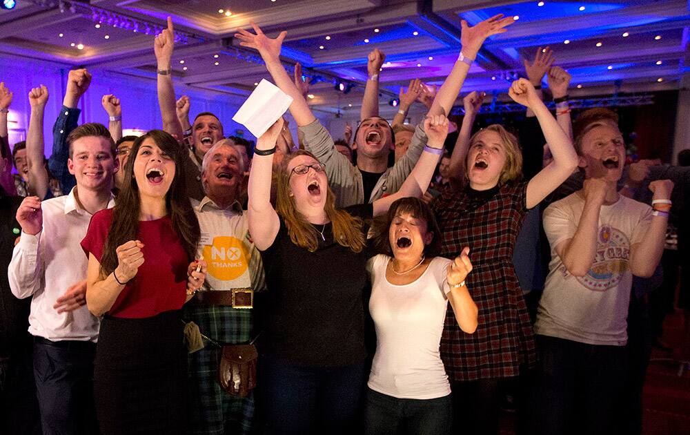 No supporters for the Scottish independence referendum celebrate a result at a No campaign event at a hotel in Glasgow, Scotland.