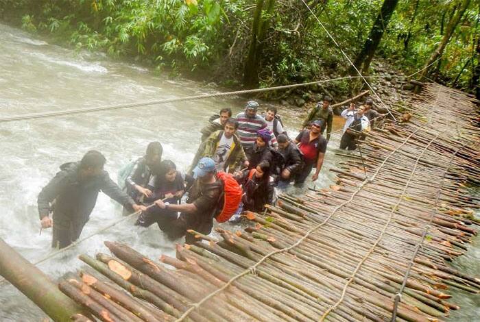 The 10 kilometer trek involves crossing streams. Image by Chandni Nihalani Kumar