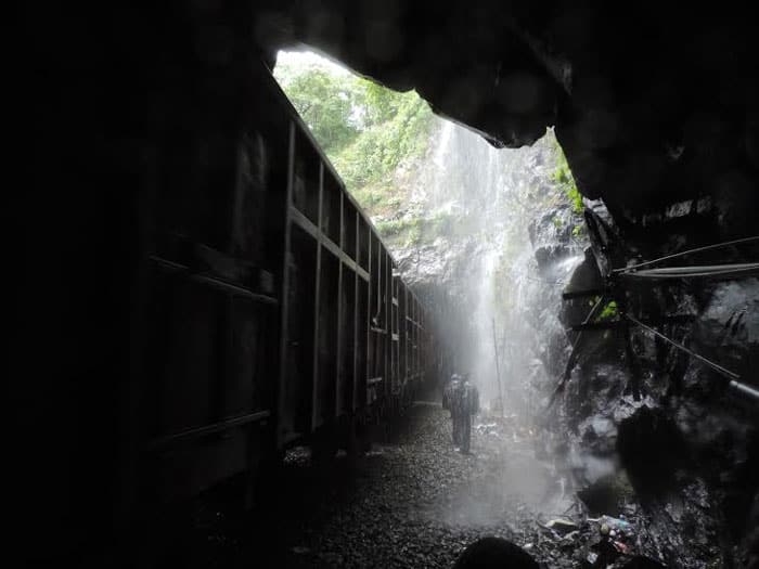 Walking through a tunnel alongside the train. Image by Chandni Nihalani Kumar