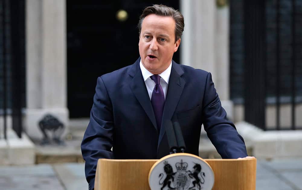 British Prime Minister David Cameron reads a statement to the media about Scotland's referendum results, outside his official residence at 10 Downing Street in central London.