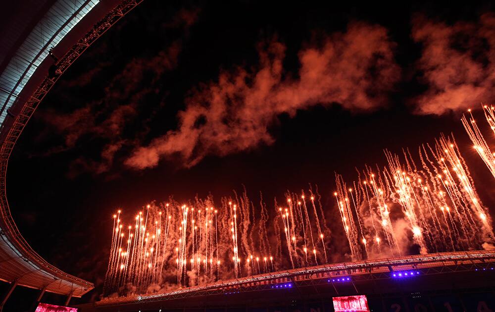 Fireworks explode over Incheon Asiad Main Stadium during the opening ceremony for the 17th Asian Games in Incheon, South Korea.