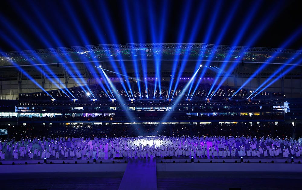 A light show is displayed during the opening ceremony for the 17th Asian Games in Incheon, South Korea.