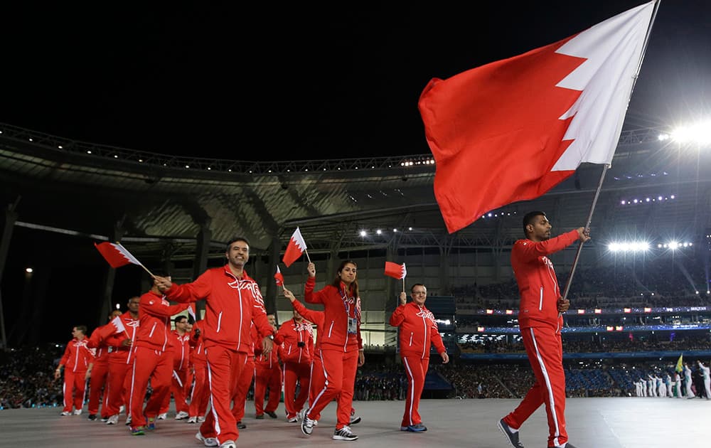 Members of the Bahrain delegation walk into the stadium during the opening ceremony for the 17th Asian Games in Incheon, South Korea.