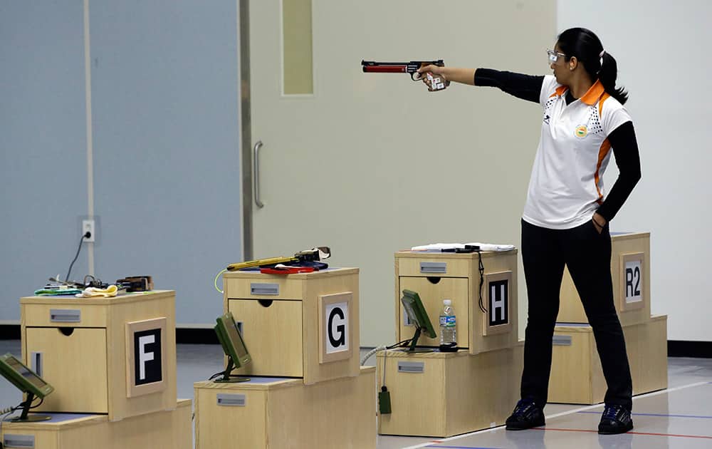 India's bronze medal winner Shweta Chaudhry competes in the final of the 10m Air Pistol Women at the Ongnyeon International Shooting Range for the 17th Asian Games in Incheon, South Korea.