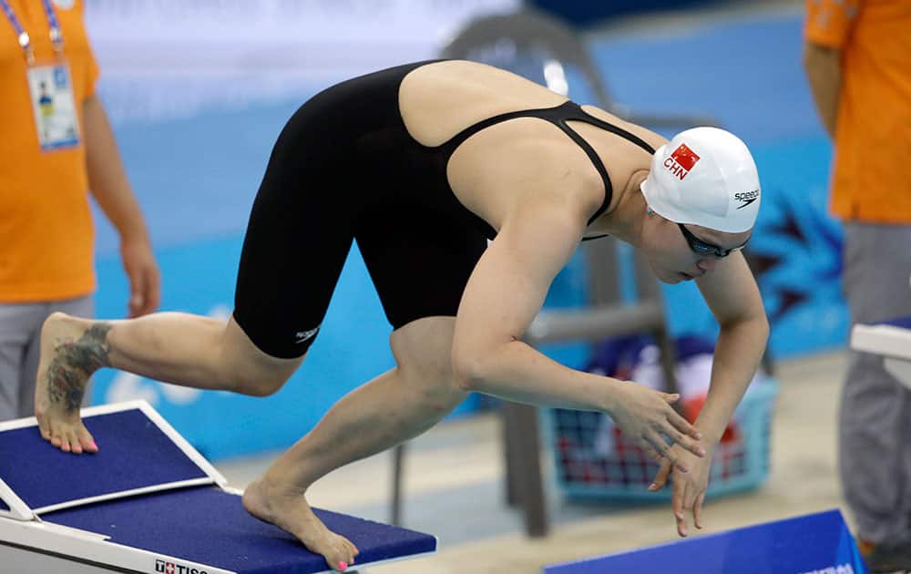 China's Tang Yi in a women's 100-meter freestyle swimming heat at the 17th Asian Games in Incheon, South Korea.