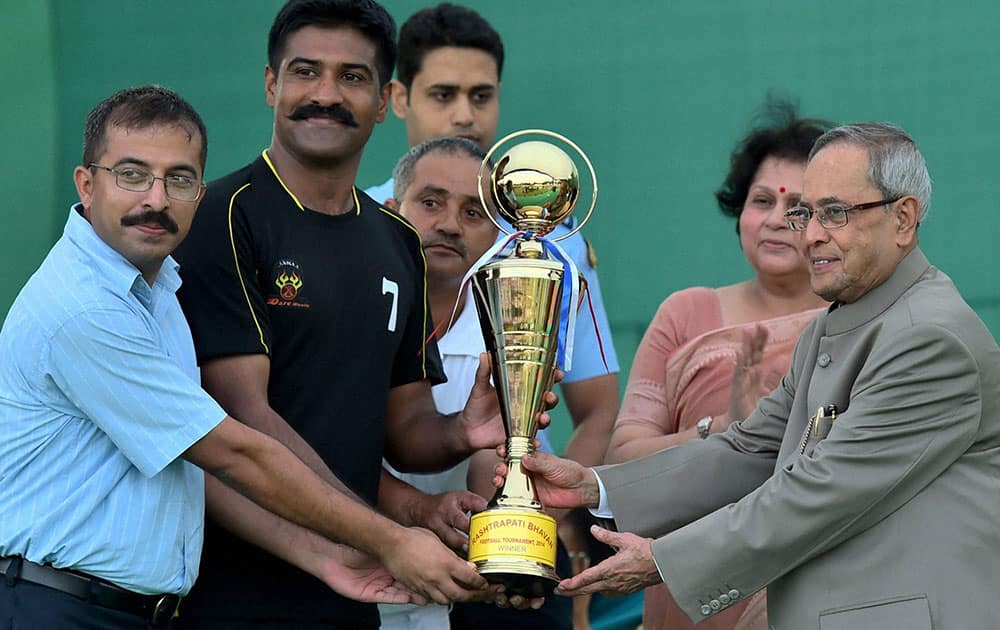 President Pranab Mukherjee present trophy to winning team after final match of Rashtrapati Bhavan Football Tournament (RBFT) at Dr. Rajendra Prasad Sarvodaya Vidyalaya, Presidents Estate in New Delhi.