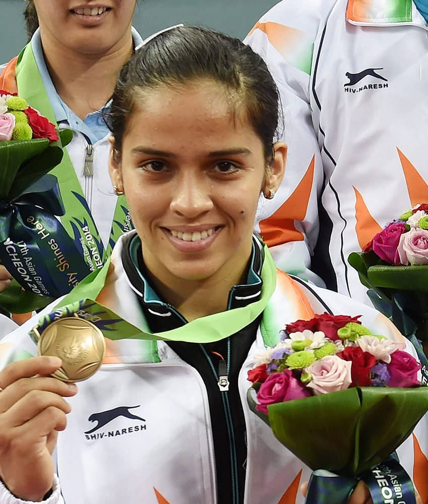 Star shuttler Saina Nehwal during the medal ceremony at the 17th Asian Games at the Gyeyang Gymnasium in Incheon, South Korea.